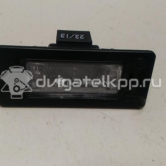 Фото Фонарь подсветки номера  8T0943021 для Audi A4 / A6 / A5 / Tt / A1