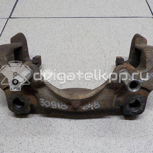 Фото Скоба суппорта переднего  1432360 для land rover Freelander 2