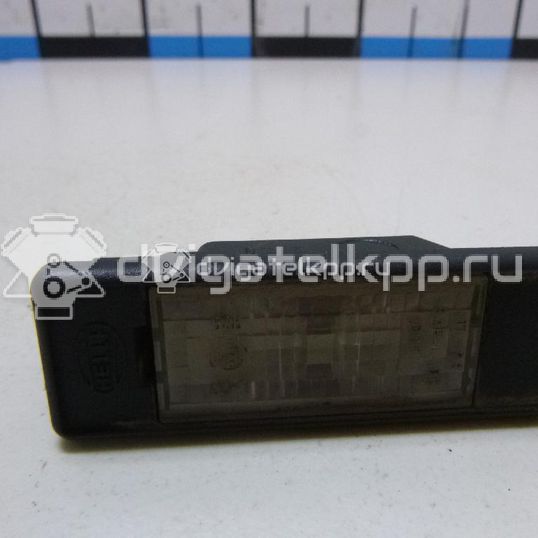 Фото Фонарь подсветки номера  26510AU300 для Nissan Primera / Micra / Note / Nv200 / Np300