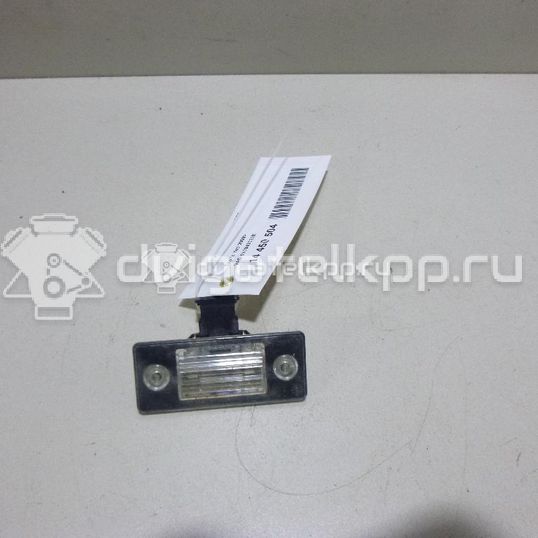 Фото Фонарь подсветки номера  6Y0943021E для Skoda Fabia / Yeti 5L