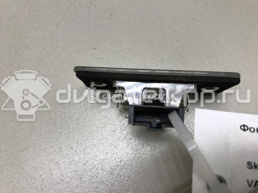 Фото Фонарь подсветки номера  6Y0943021E для Skoda Fabia / Yeti 5L {forloop.counter}}