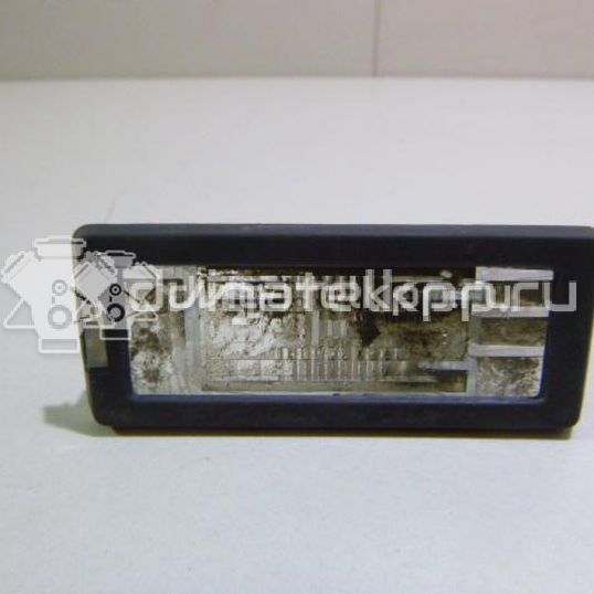 Фото Фонарь подсветки номера  8200013577 для Renault Modus Grand F Jp0 / Megane / Clio / Laguna / Scénic