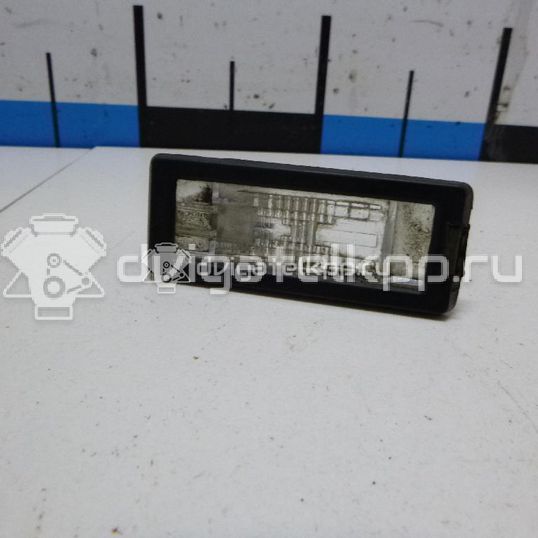 Фото Фонарь подсветки номера  8200013577 для Renault Modus Grand F Jp0 / Megane / Clio / Laguna / Scénic