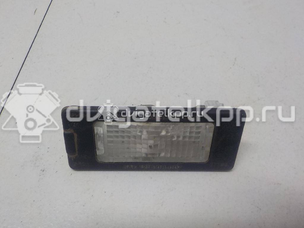 Фото Фонарь подсветки номера  5N0943021 для Seat Ibiza / Alhambra {forloop.counter}}