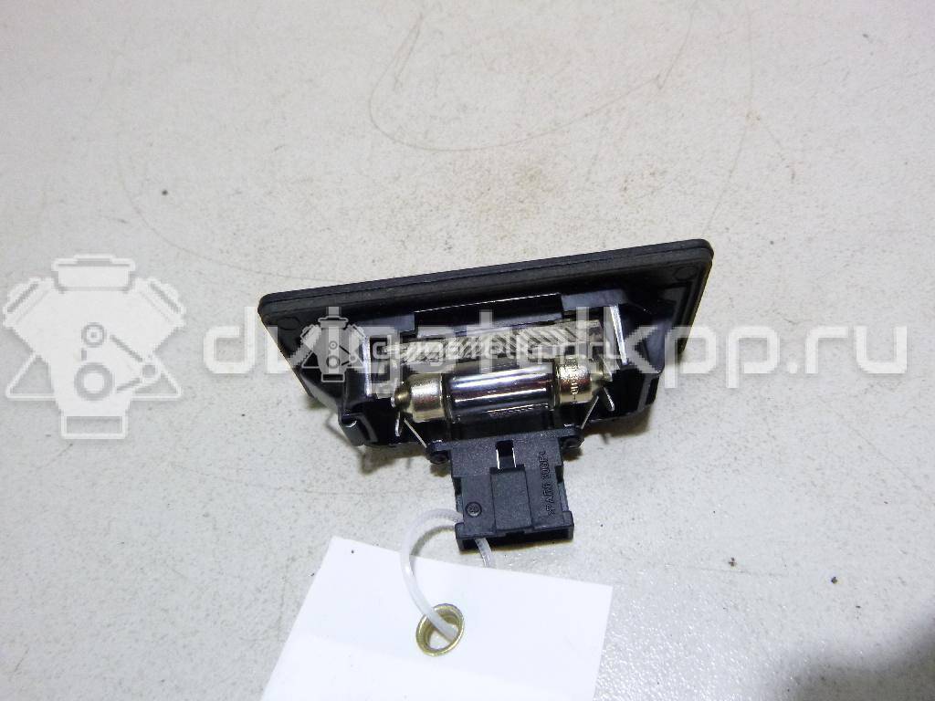 Фото Фонарь подсветки номера  8T0943021 для vw Passat [B6] {forloop.counter}}