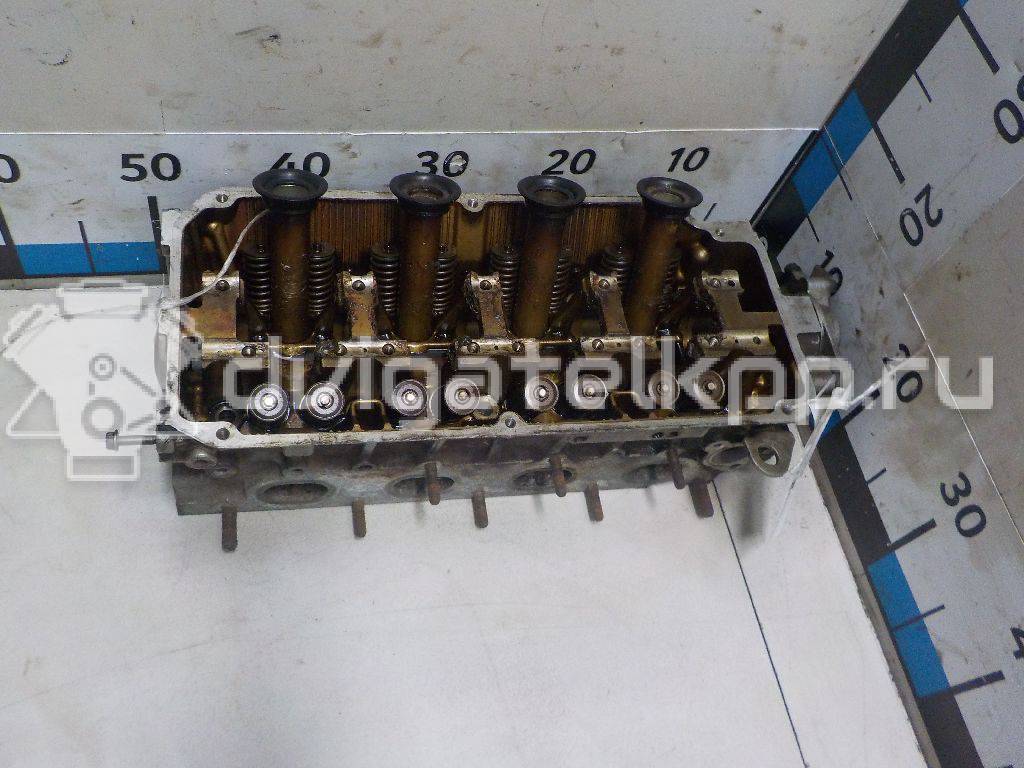 Фото Головка блока для двигателя 4G92 (DOHC 16V) для Mitsubishi Mirage 147-174 л.с 16V 1.6 л бензин {forloop.counter}}