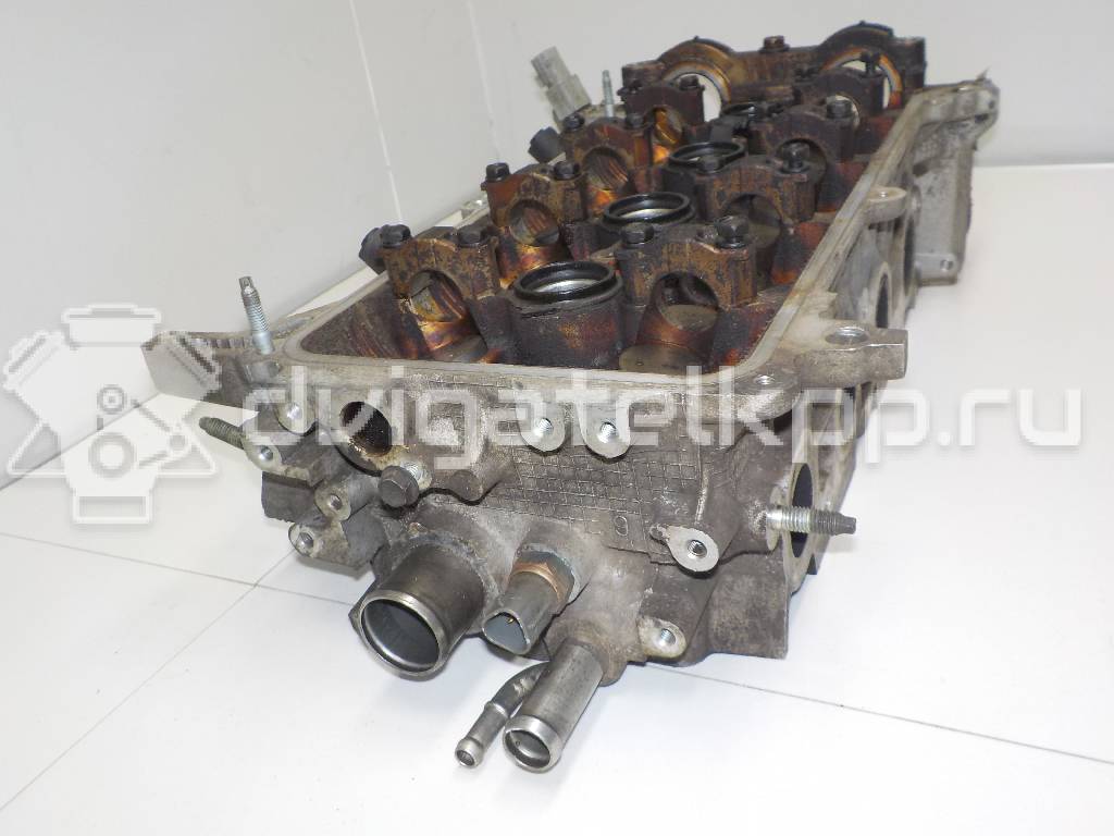 Фото Головка блока для двигателя 1NZ-FE для Subaru / Mitsuoka / Toyota 103-109 л.с 16V 1.5 л бензин 1110121033 {forloop.counter}}