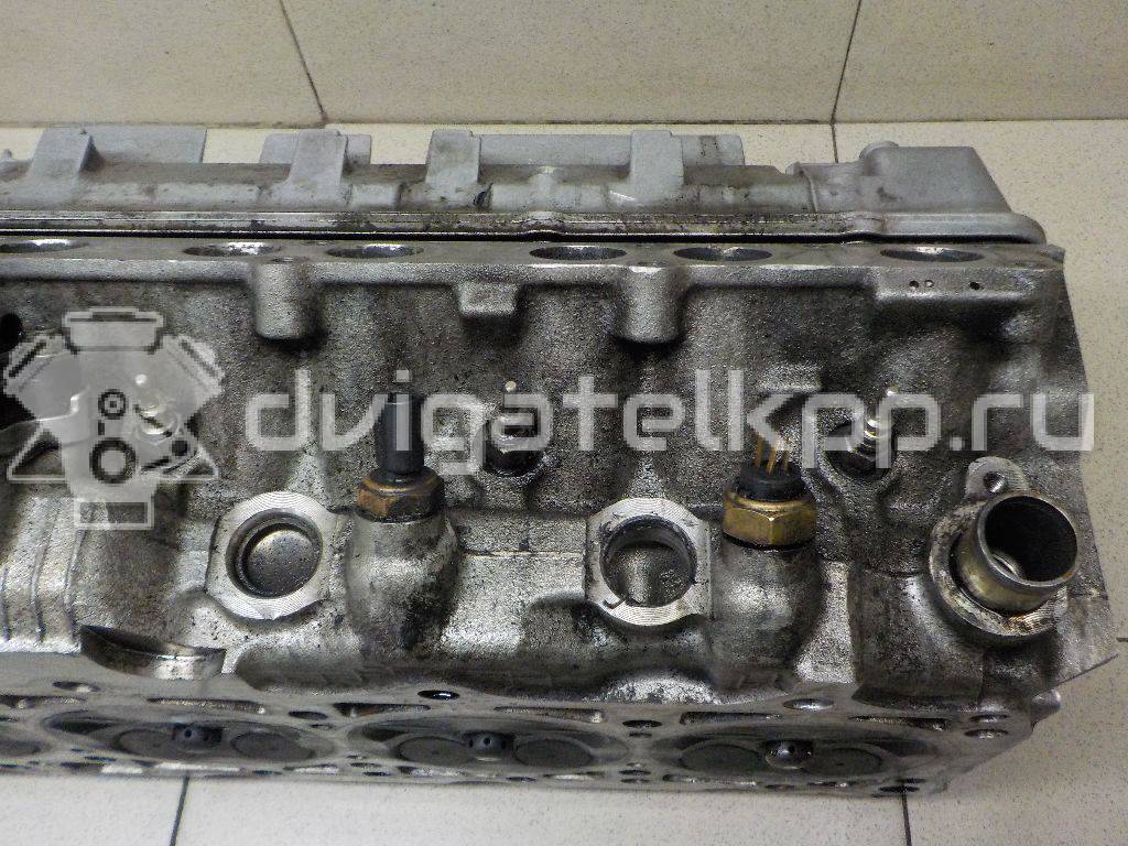 Фото Головка блока для двигателя OM 604.912 (OM 604 D22) для Mercedes-Benz E-Class 75-95 л.с 16V 2.2 л Дизельное топливо {forloop.counter}}