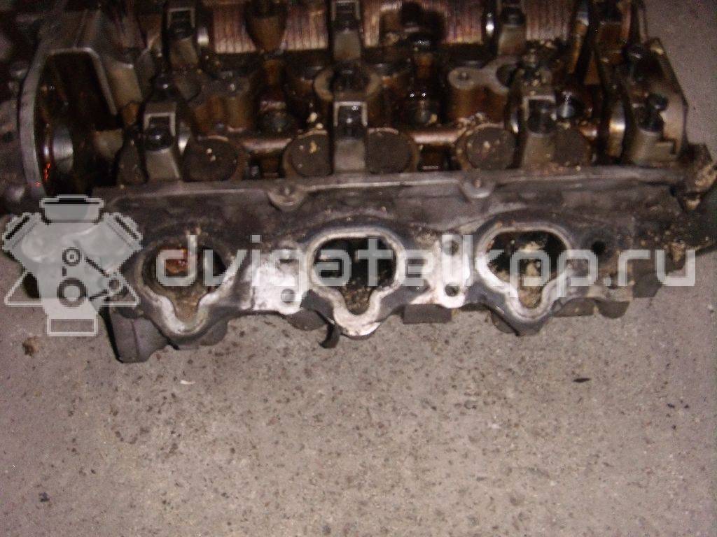 Фото Головка блока для двигателя B6 (DOHC) для Mazda Xedos / 323 107-109 л.с 16V 1.6 л бензин {forloop.counter}}