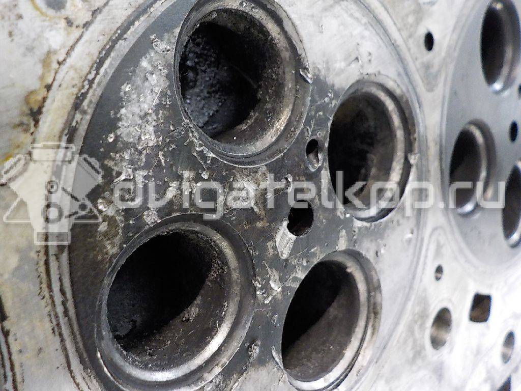 Фото Головка блока для двигателя D4CB для Hyundai / Kia 129-178 л.с 16V 2.5 л Дизельное топливо 221004A310 {forloop.counter}}