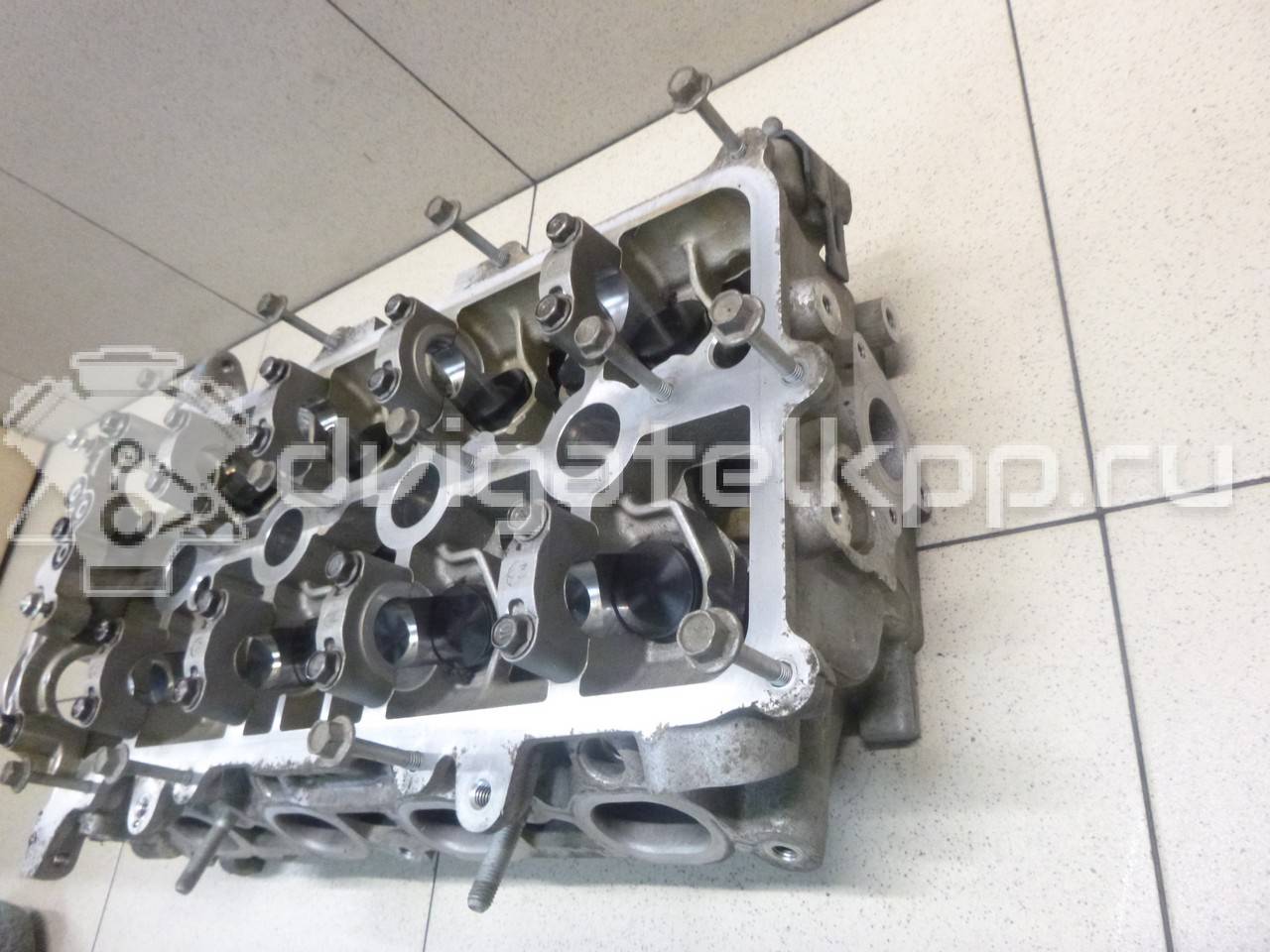 Фото Головка блока для двигателя G4FG для Hyundai (Beijing) / Hyundai / Kia 123-128 л.с 16V 1.6 л бензин 221002B250 {forloop.counter}}