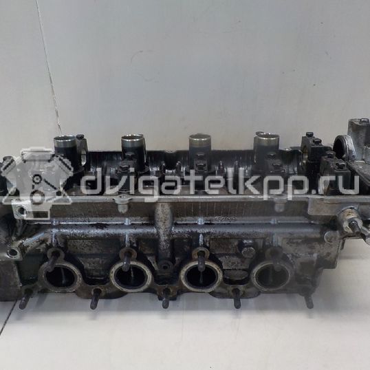 Фото Головка блока для двигателя G4EE для Hyundai / Kia 97 л.с 16V 1.4 л бензин 2210026100