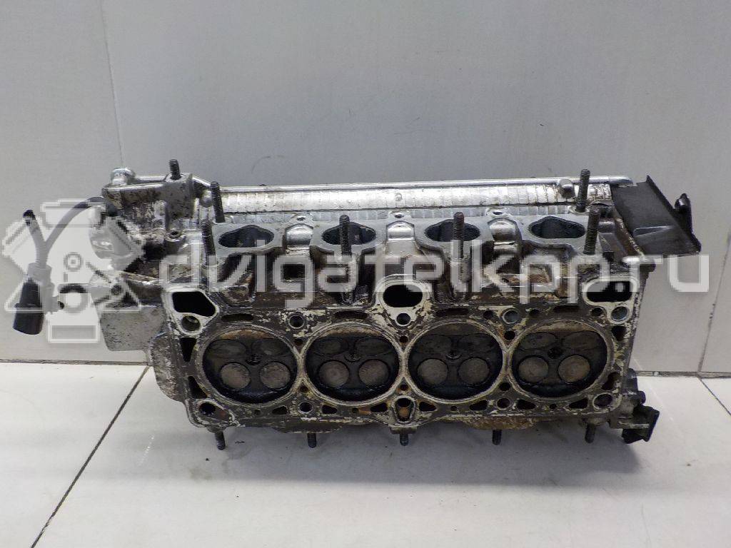 Фото Головка блока для двигателя G4EE для Hyundai / Kia 97 л.с 16V 1.4 л бензин 2210026100 {forloop.counter}}