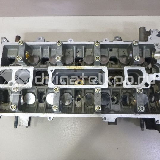 Фото Головка блока для двигателя BP (DOHC) для Mazda / Ford Australia / Eunos 125-130 л.с 16V 1.8 л бензин 5207010