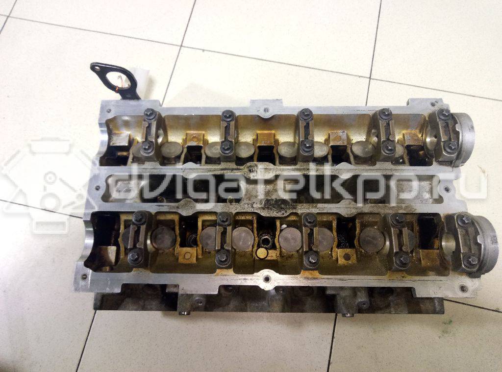 Фото Головка блока для двигателя BP (DOHC) для Mazda / Ford Australia / Eunos 103-125 л.с 16V 1.8 л бензин {forloop.counter}}