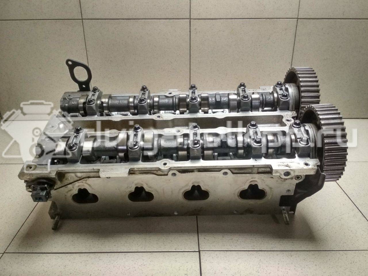 Фото Головка блока для двигателя BP (DOHC) для Mazda / Ford Australia / Eunos 103-125 л.с 16V 1.8 л бензин {forloop.counter}}