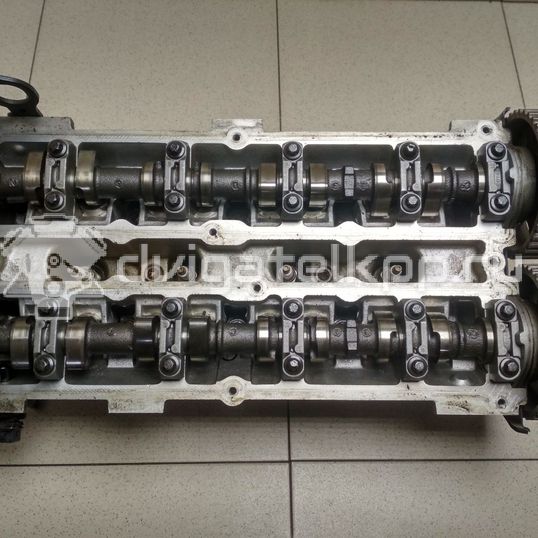 Фото Головка блока для двигателя BP (DOHC) для Mazda / Ford Australia / Eunos 125-130 л.с 16V 1.8 л бензин