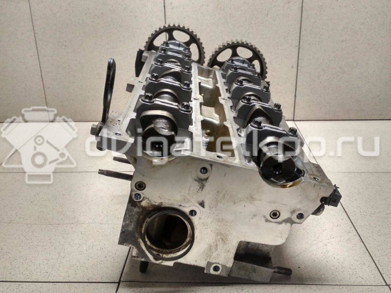 Фото Головка блока для двигателя BP (DOHC) для Mazda / Ford Australia / Eunos 125-130 л.с 16V 1.8 л бензин {forloop.counter}}