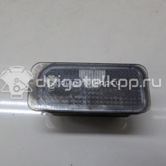 Фото Фонарь подсветки номера  5105886 для Ford Fiesta / Focus / Tourneo / C-Max / Ka