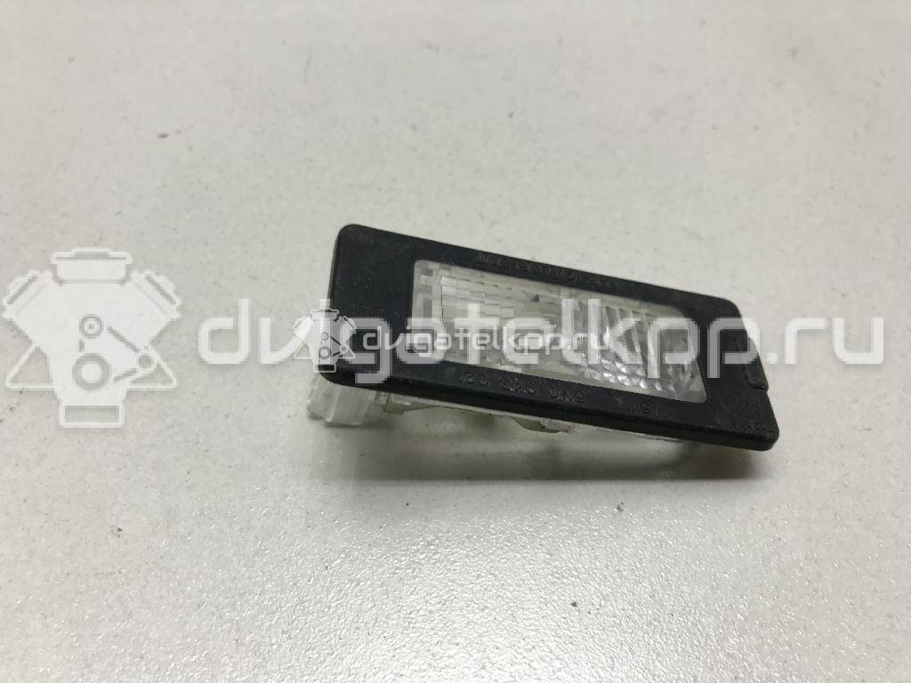 Фото Фонарь подсветки номера  5N0943021 для Seat Ibiza / Alhambra {forloop.counter}}