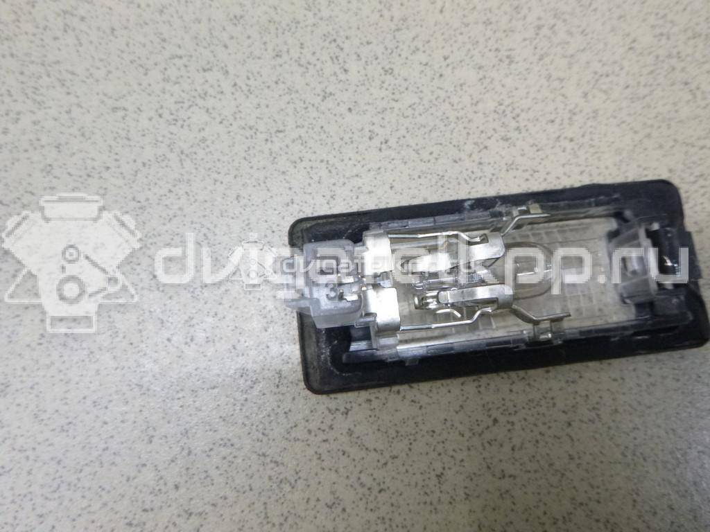 Фото Фонарь подсветки номера  5N0943021 для Seat Ibiza / Alhambra {forloop.counter}}