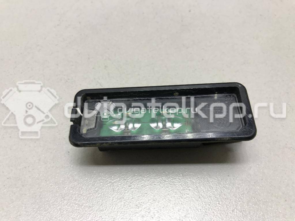 Фото Фонарь подсветки номера  1K8943021C для Seat Leon / Toledo {forloop.counter}}