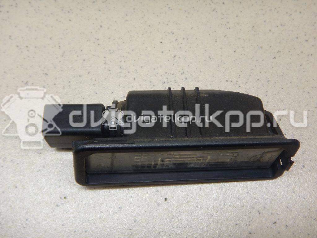 Фото Фонарь подсветки номера  1K8943021 для Volkswagen Scirocco / Polo / Touran / Amarok S1B / New Beetle {forloop.counter}}