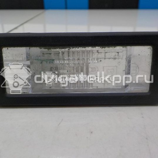 Фото Фонарь подсветки номера  8200013577 для renault Modus