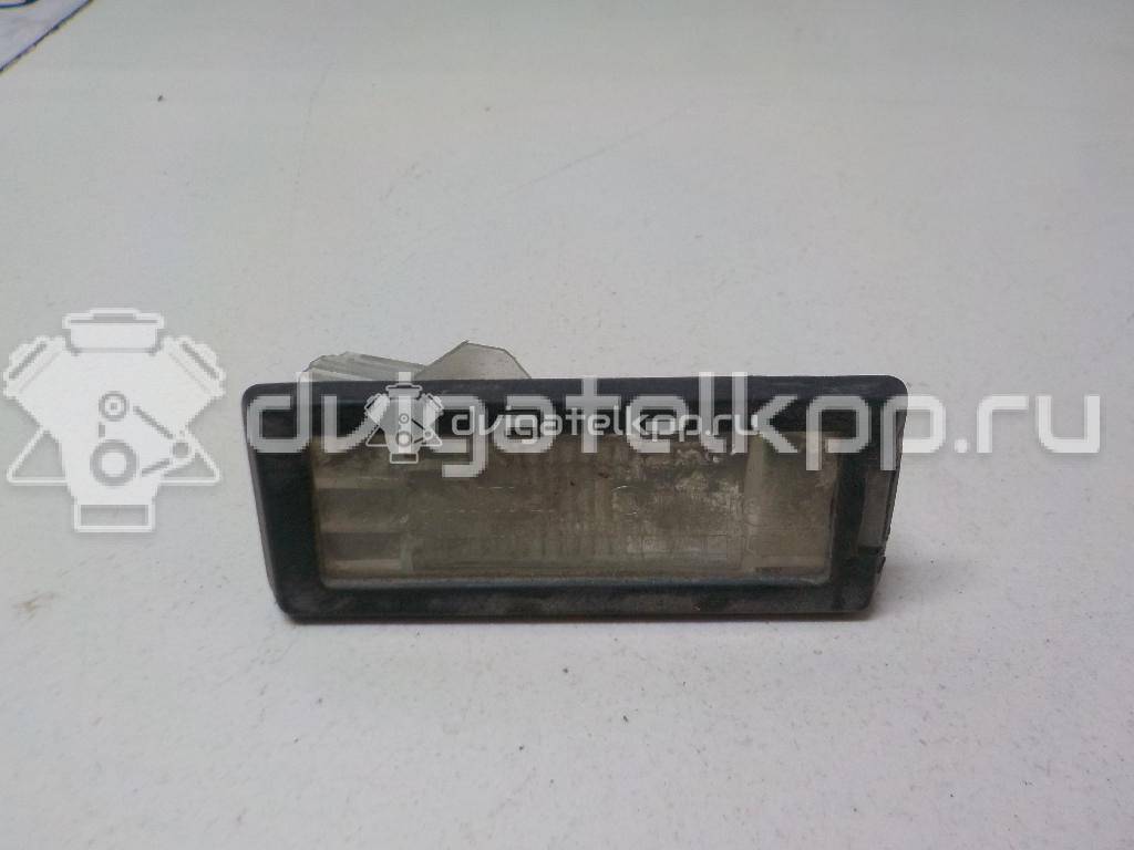 Фото Фонарь подсветки номера  8200013577 для Renault Modus Grand F Jp0 / Megane / Clio / Laguna / Scénic {forloop.counter}}