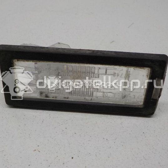 Фото Фонарь подсветки номера  8200013577 для Renault Modus Grand F Jp0 / Megane / Clio / Laguna / Scénic