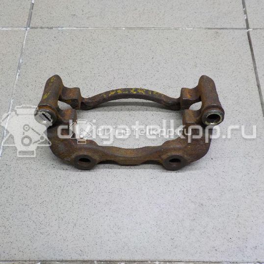 Фото Скоба суппорта переднего  357615125A для Volkswagen Vento 1H2 / Golf / Passat / Transporter / Polo