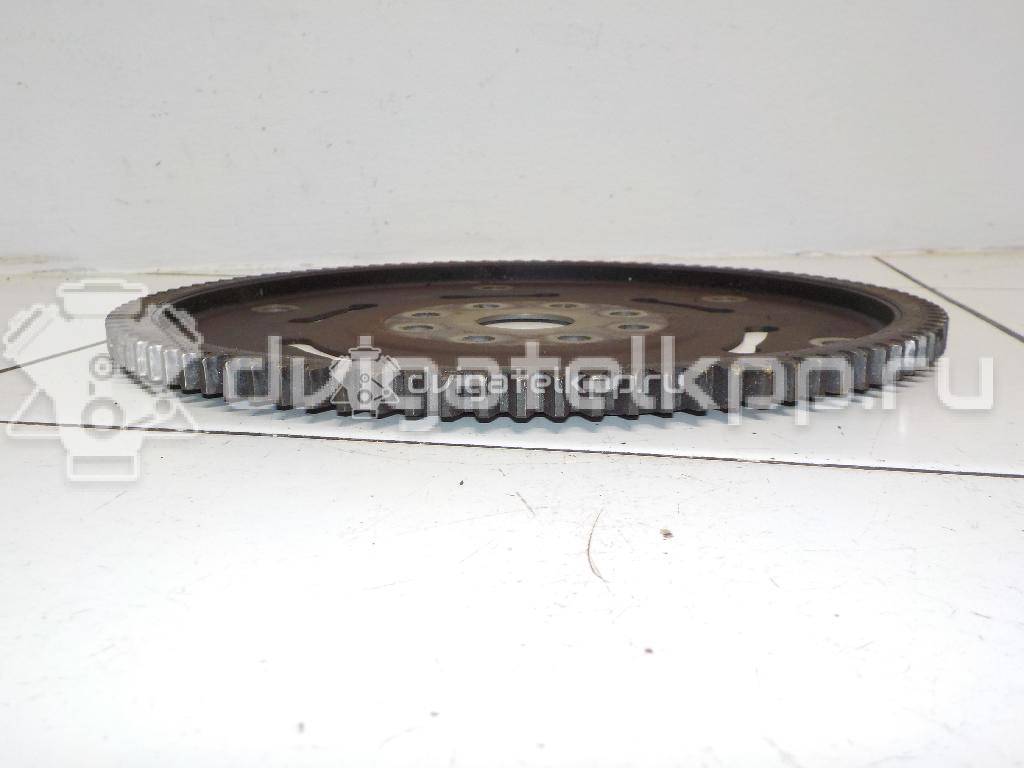 Фото Маховик для двигателя J20A для Maruti Suzuki / Suzuki / Chevrolet / Geo / Maruti 128-147 л.с 16V 2.0 л бензин 2262077EB1 {forloop.counter}}