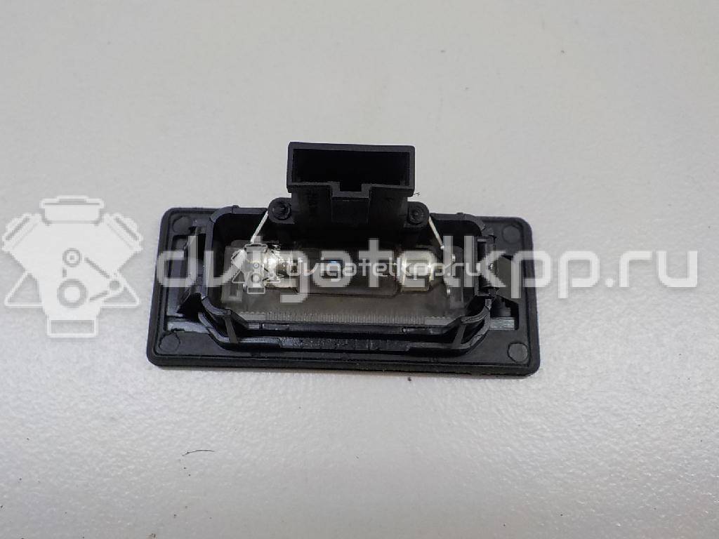 Фото Фонарь подсветки номера  8T0943021 для vw Passat [B6] {forloop.counter}}