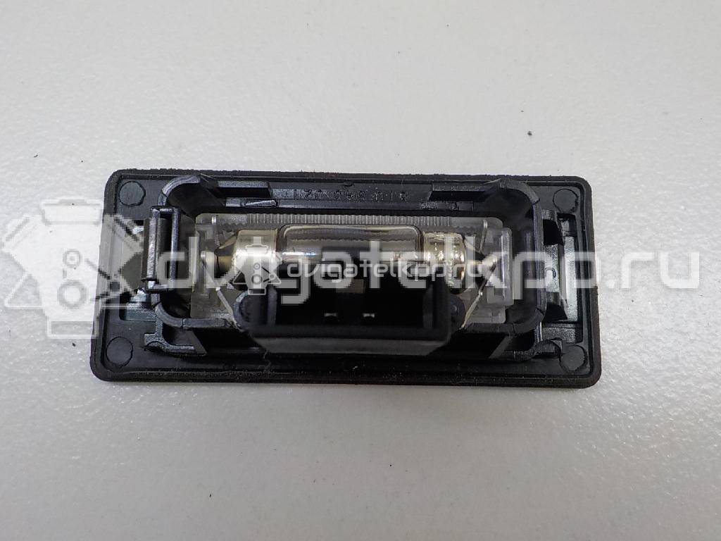 Фото Фонарь подсветки номера  8T0943021 для vw Passat [B6] {forloop.counter}}