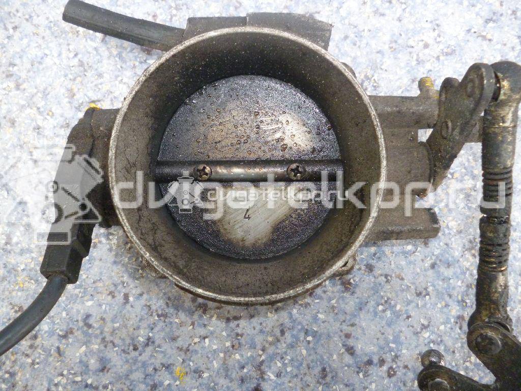 Фото Заслонка дроссельная механическая  0021402653 для Mercedes-Benz Coupe / Kombi T-Model / W124 {forloop.counter}}