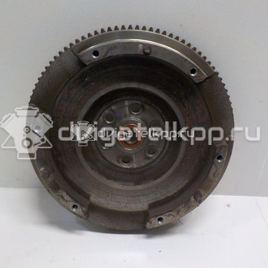 Фото Маховик для двигателя K12B для Suzuki / Mitsubishi / Vauxhall 86-94 л.с 16V 1.2 л бензин 1262051K00