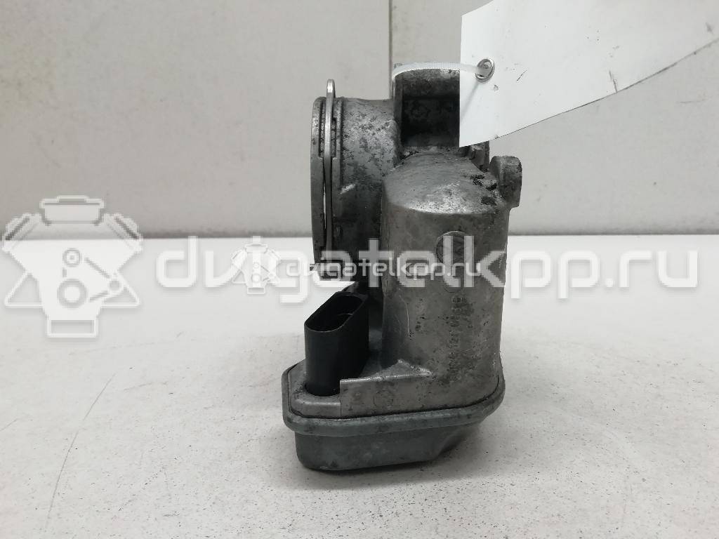 Фото Заслонка дроссельная электрическая  03G128063B для dodge Caliber {forloop.counter}}