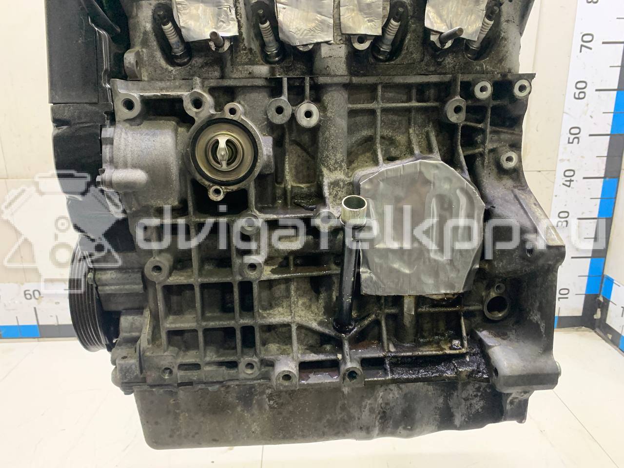 Фото Контрактный (б/у) двигатель AKL для Volkswagen / Seat 101-103 л.с 8V 1.6 л бензин 06A100098X {forloop.counter}}