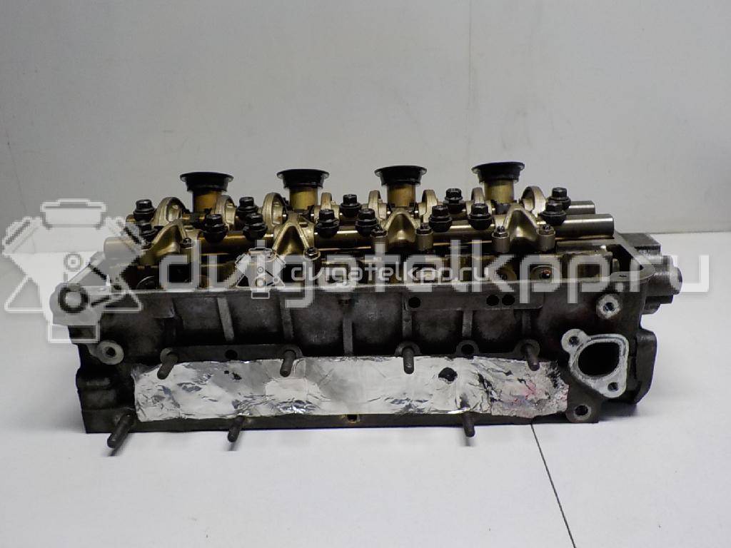 Фото Головка блока для двигателя 4G92 (DOHC 16V) для Mitsubishi Mirage 147-174 л.с 16V 1.6 л бензин {forloop.counter}}