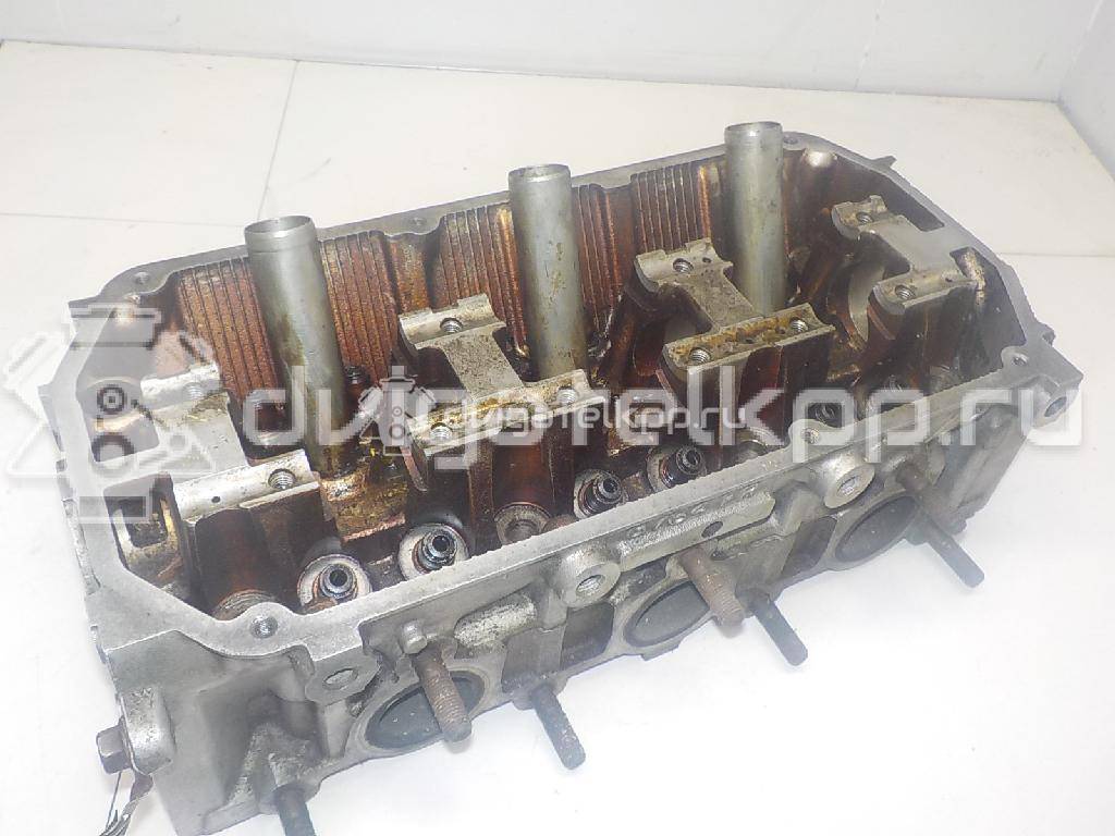 Фото Головка блока для двигателя 6G72 (DOHC 24V) для Mitsubishi Eclipse / Diamante / Galant / Pajero / L 143-286 л.с 24V 3.0 л бензин MD307677 {forloop.counter}}