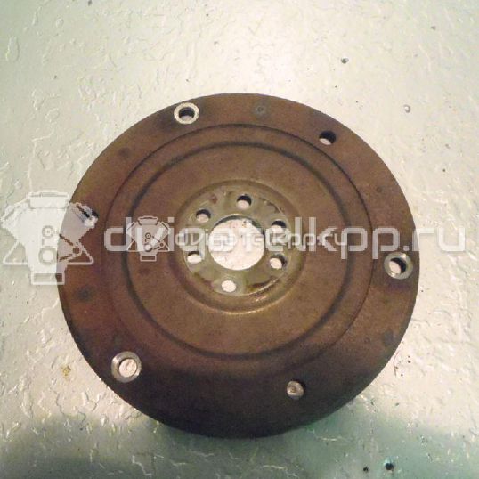 Фото Маховик для двигателя AKL для Volkswagen / Seat 100-103 л.с 8V 1.6 л бензин 068105323D