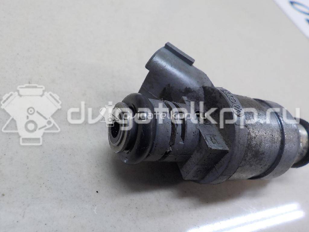 Фото Форсунка инжекторная электрическая  06A906031BT для Volkswagen Touran / Golf / Passat / Caddy / Jetta {forloop.counter}}