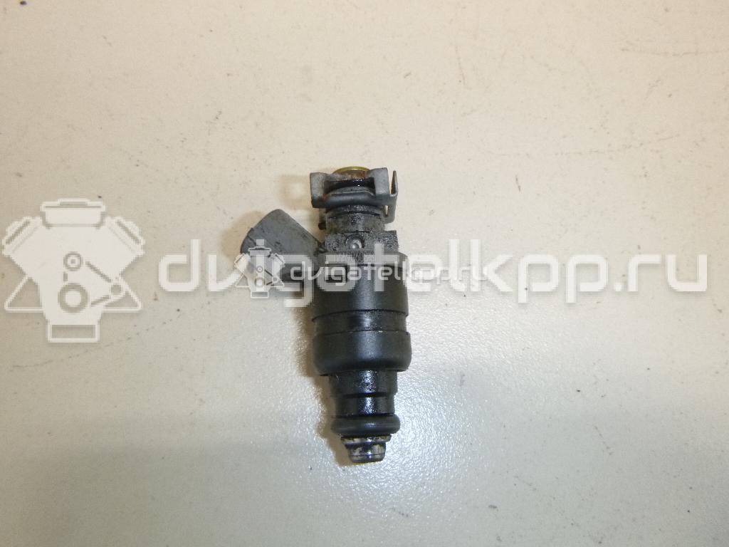 Фото Форсунка инжекторная электрическая  06A906031BT для Volkswagen Touran / Golf / Passat / Caddy / Jetta {forloop.counter}}