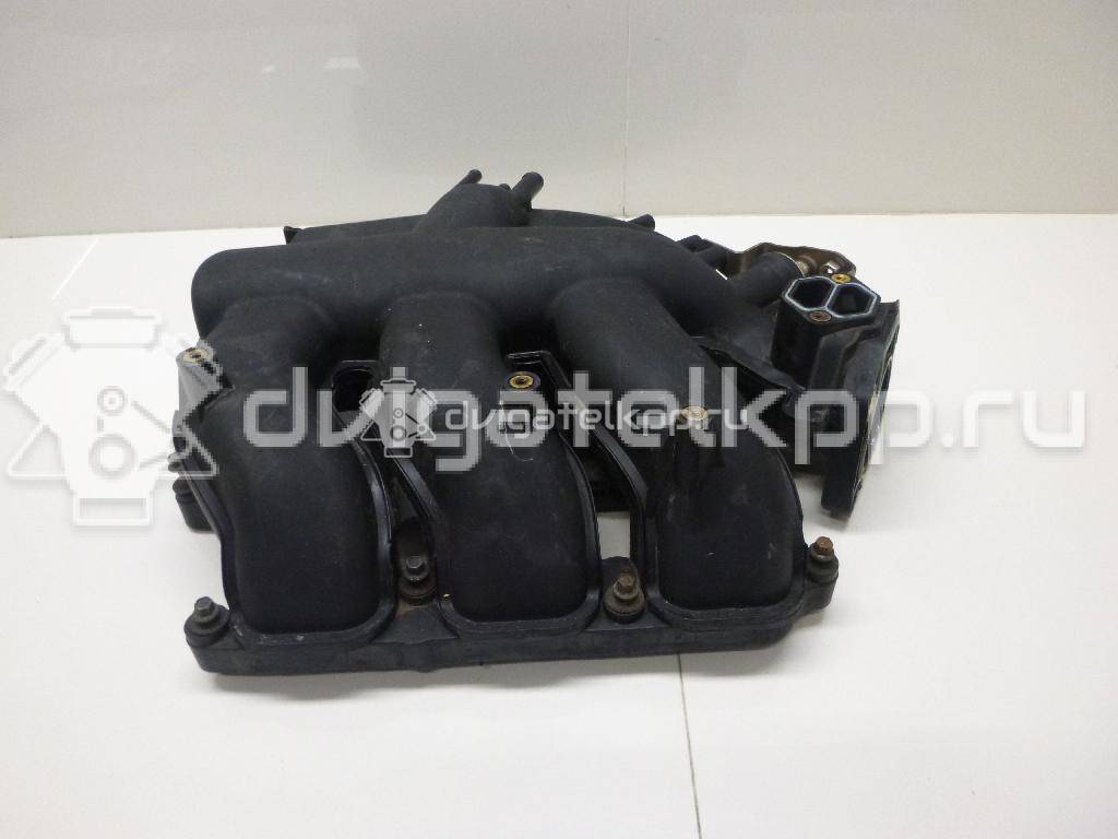 Фото Коллектор впускной для двигателя B6 (DOHC) для Mazda Xedos / 323 107-109 л.с 16V 1.6 л бензин YL8E9424CD {forloop.counter}}