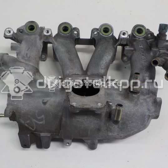 Фото Коллектор впускной для двигателя QG16DE для Nissan Sunny / Bluebird / Avenir / Primera / Almera 102-120 л.с 16V 1.6 л бензин