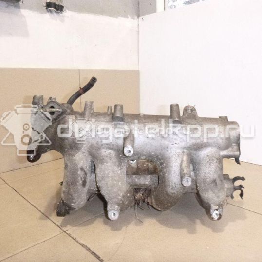 Фото Коллектор впускной для двигателя QG16DE для Nissan Sunny / Bluebird / Avenir / Primera / Almera 102-120 л.с 16V 1.6 л бензин