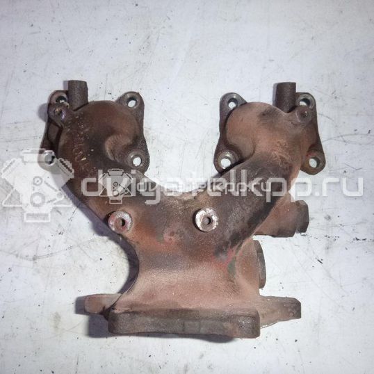 Фото Коллектор выпускной для двигателя QG16DE для Nissan Sunny / Bluebird / Avenir / Primera / Almera 102-120 л.с 16V 1.6 л бензин