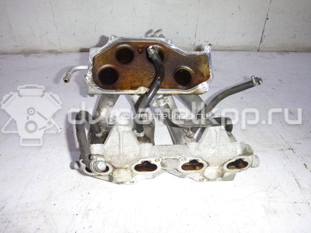 Фото Коллектор впускной для двигателя QG16DE для Nissan Sunny / Bluebird / Avenir / Primera / Almera 102-120 л.с 16V 1.6 л бензин {forloop.counter}}