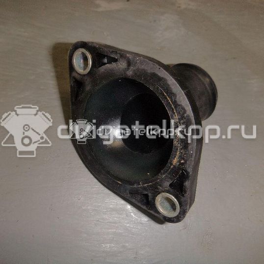 Фото Крышка термостата для двигателя MR18DE для Nissan (Dongfeng) / Mazda / Mitsubishi / Nissan 106-132 л.с 16V 1.8 л Бензин/спирт 13049ET000