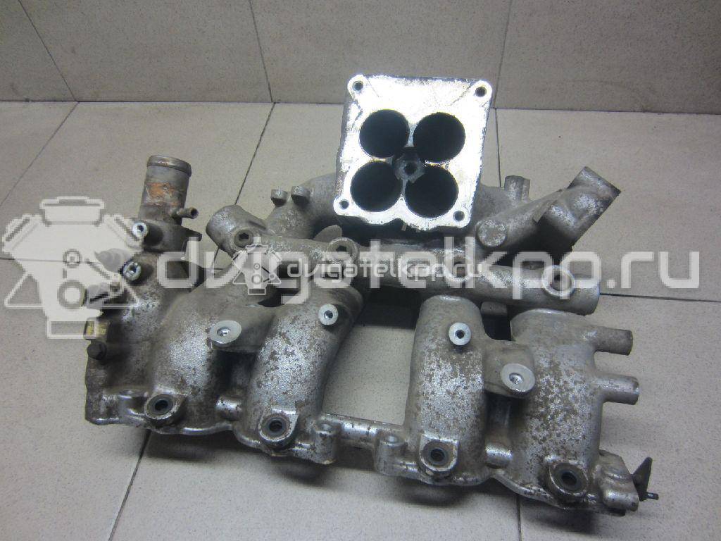 Фото Коллектор впускной для двигателя KA24E для Ford Australia / Nissan 116-143 л.с 12V 2.4 л бензин 140010F300 {forloop.counter}}